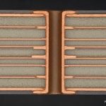 Cross-section micrograph of a multilayer RO4000 PCB showing stable plated through-holes, copper bonding, and dielectric layer structure for high-frequency circuit applications.