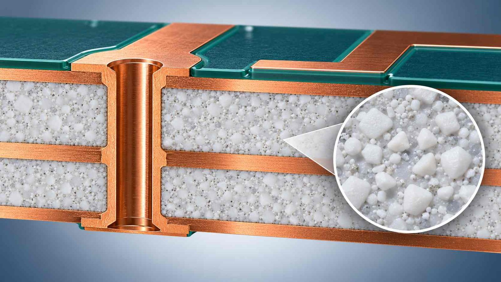 Cross-section of an RF-35TC ceramic-filled PTFE laminate with through-hole barrel and magnified dielectric grain